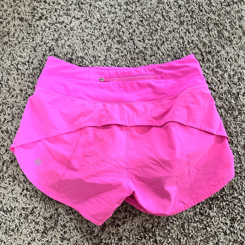 lululemon sonic pink , size 6, 4’ inseam